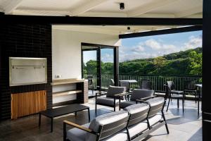 Balkón nebo terasa v ubytování 180° Luxury Ocean Suites - #201