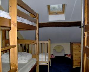 Krevet ili kreveti na sprat u jedinici u okviru objekta Gîte du Grand Taïchou