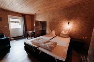 Postel nebo postele na pokoji v ubytování Trekkershut De Tulpenweide