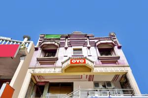 an apartment building with an omega sign on it at SPOT ON Lewis Paradise in Bhubaneshwar