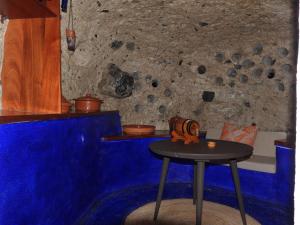 a table with a pumpkin sitting on top of it at Tonono´s Village in Santa Maria de Guia de Gran Canaria