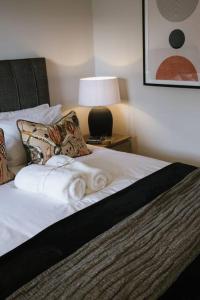 Postel nebo postele na pokoji v ubytování 180° Luxury Ocean Suites - #302