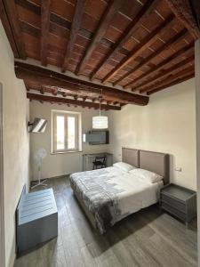 Postel nebo postele na pokoji v ubytování Locazione Turistica Rania