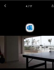 a picture of a table in a room with a window at SALINAS PARCK in Salinópolis