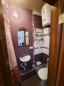 Kúpeľňa v ubytovaní Квартира возле Радмир ул.Чернивецкая 5в + 3 fotografie