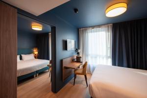 Hôtel de la Cité客房内的一张或多张床位