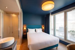Hôtel de la Cité客房内的一张或多张床位