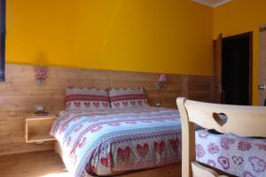 Postelja oz. postelje v sobi nastanitve Albergo Rotenthal