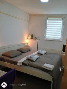 Postel nebo postele na pokoji v ubytování Hostel Lega House