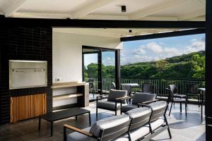 Balkón nebo terasa v ubytování 180° Luxury Ocean Suites - #304