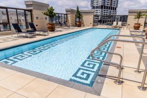 a swimming pool on top of a building at City Nest - Michelangelo Towers in Johannesburg