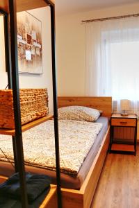 Un pat sau paturi într-o cameră la Apartment Andreas Bichler