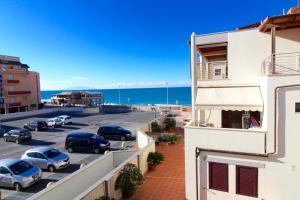 a view of a parking lot from a building at Rif. B16 - MEDITERRANEO in San Vincenzo