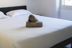 Llit o llits en una habitació de Residence Piatana