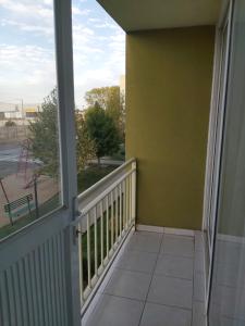 En balkon eller terrasse på Departamento Single