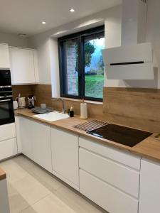 Köök või kööginurk majutusasutuses Gîte Le Chambougeal avec spa privatif