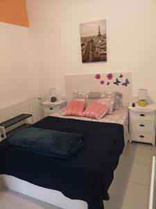 Postel nebo postele na pokoji v ubytování Hostel de las Facultades