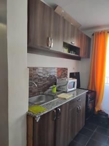 Una cocina o zona de cocina en Beautiful and Affordable 1brm in Milimani