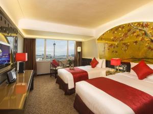 Televiisor ja/või meelelahutuskeskus majutusasutuses Hotel Riviera Macau