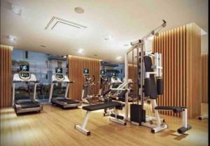 Posilňovňa alebo fitness centrum v ubytovaní Urocze mieszkanie z tarasem.Gym.Netflix.WiFi