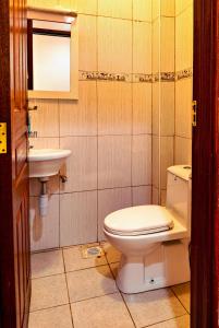Koupelna v ubytování MANI HOMES