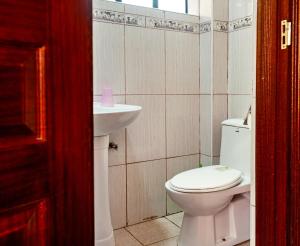 Koupelna v ubytování MANI HOMES