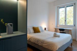 Tempat tidur dalam kamar di IHost Luxury Flat - Zara 108