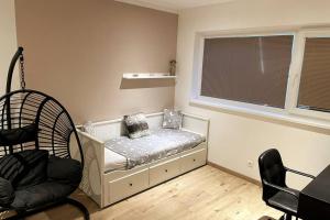 Posteľ alebo postele v izbe v ubytovaní Dom v kľudnej časti Senca s vírivkou / business & relax /