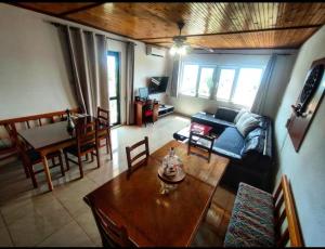 a living room with a couch and a table at Manora Sucuraj 2 bedroom apartment in Sućuraj