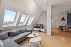 Μια τηλεόραση ή/και κέντρο ψυχαγωγίας στο Hygge Homes - Traumhafte Altbauwohnung nahe Lüneburgs Altstadt