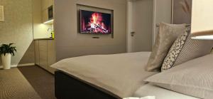 Postel nebo postele na pokoji v ubytování Apartment Holata 201