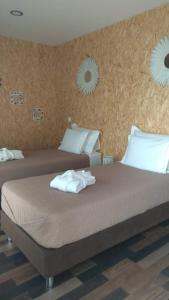 Postel nebo postele na pokoji v ubytování ALLuar Lodge + 37 fotografií