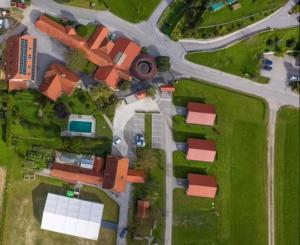 an overhead view of a house with a street at Glamping Laško in Laško