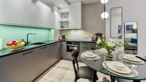 Kuchnia lub aneks kuchenny w obiekcie Rezydencja Niechorze 224 - 5D Apartamenty