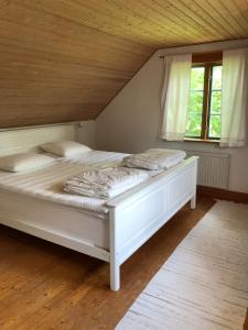 Postel nebo postele na pokoji v ubytování Övra Berg