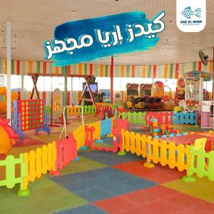 a childrens play area with colorful play equipment at LUSINDA HOTEL MANAGEMENT BY ZAD in Suez