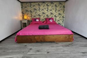 Letto o letti in una camera di Bungalow Tipanier - Vue parfaite