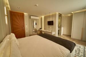 Letto o letti in una camera di Pyramids Charm Hotel