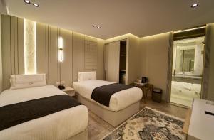 Letto o letti in una camera di Pyramids Charm Hotel