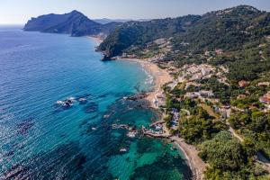 an aerial view of a beach and the ocean at Gaia - A Secret Luxury Hideaway in Achílleion