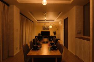 a long dining room with a long table and chairs at Kiyosumi SOHO4B, 5th floor, 6th floor - Vacation STAY 20622v in Tokyo