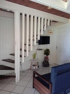 TV a/nebo společenská místnost v ubytování Appart'hotel La croisière