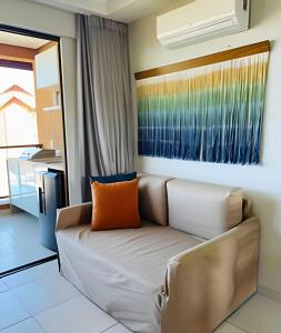 Area tempat duduk di Apartamento EcoResort Carneiros