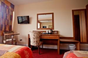 TV o dispositivi per l'intrattenimento presso West County Hotel