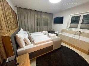 A bed or beds in a room at Refugium Eckberg