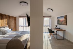 A bed or beds in a room at Refugium Eckberg