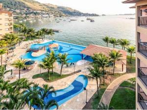 Pemandangan kolam renang di Angra dos Reis - Apartamentos com Vista para o mar OU para piscina Condomínio Porto Bali atau berdekatan