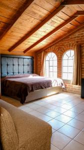 Postel nebo postele na pokoji v ubytování Hotel Real de San Antonio