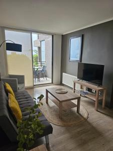 TV a/nebo společenská místnost v ubytování Espectacular Bahía Bonita Depto 14
