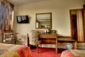 TV o dispositivi per l'intrattenimento presso West County Hotel